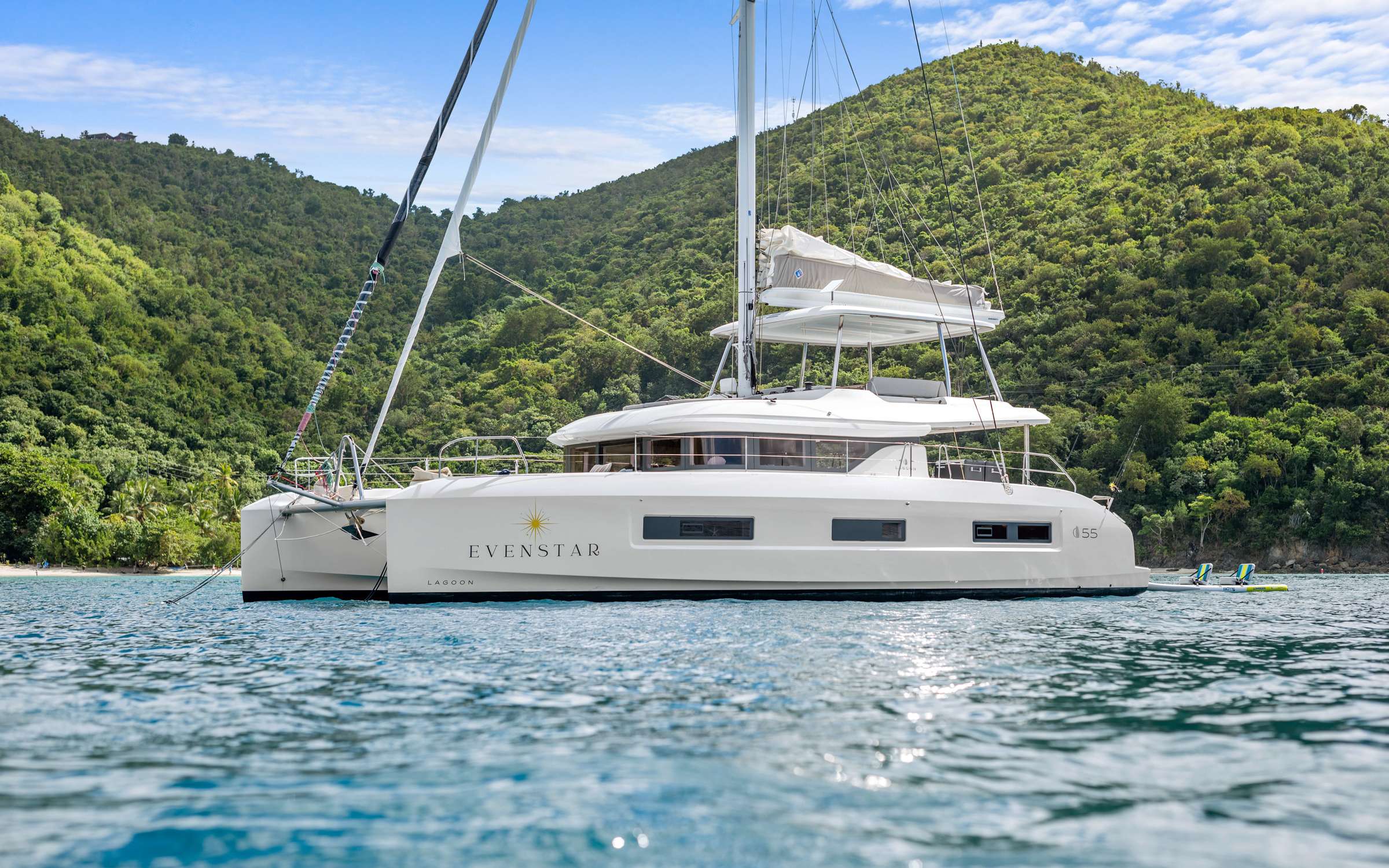 Embark on a luxurious journey aboard the Evenstar, a stunning 2025 55' Lagoon sailing catamaran, where the romance of the old English evening star meets modern opulence. As the first 