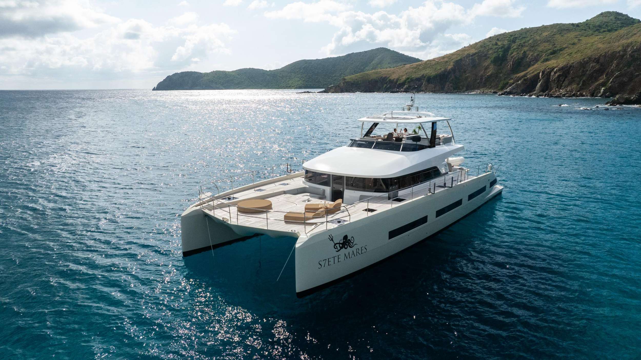 “The Seven Seas are Calling”

Siete Mares will accommodate 8 charter guests in 4 staterooms that offer the option for differing cabin arrangements if needed. She is a 2025 motor catamaran with a Williams 110 HP, 15 foot, 8 passenger tender, hardwood decking, hydraulic lift, state of the art water treatment system, luxury staterooms with in suite televisions and stereo systems, galley down with full wet bar in the salon, interior and exterior dining options, interior lounge with a 55 inch retractable flat screen television, exquisitely customizable menu, eco-friendly and reef safe toiletries, bar stocked to guest preference, 1 two-person kayak, water skis, wakeboard, 4 stand up paddle boards convertible to a windsurfer, 8 underwater scooters, deep sea fishing equipment, snorkeling gear, floating dock, rendezvous scuba diving, yoga mats, exercise bands, dumbbells, board and card games and Siete Mares giveaways.