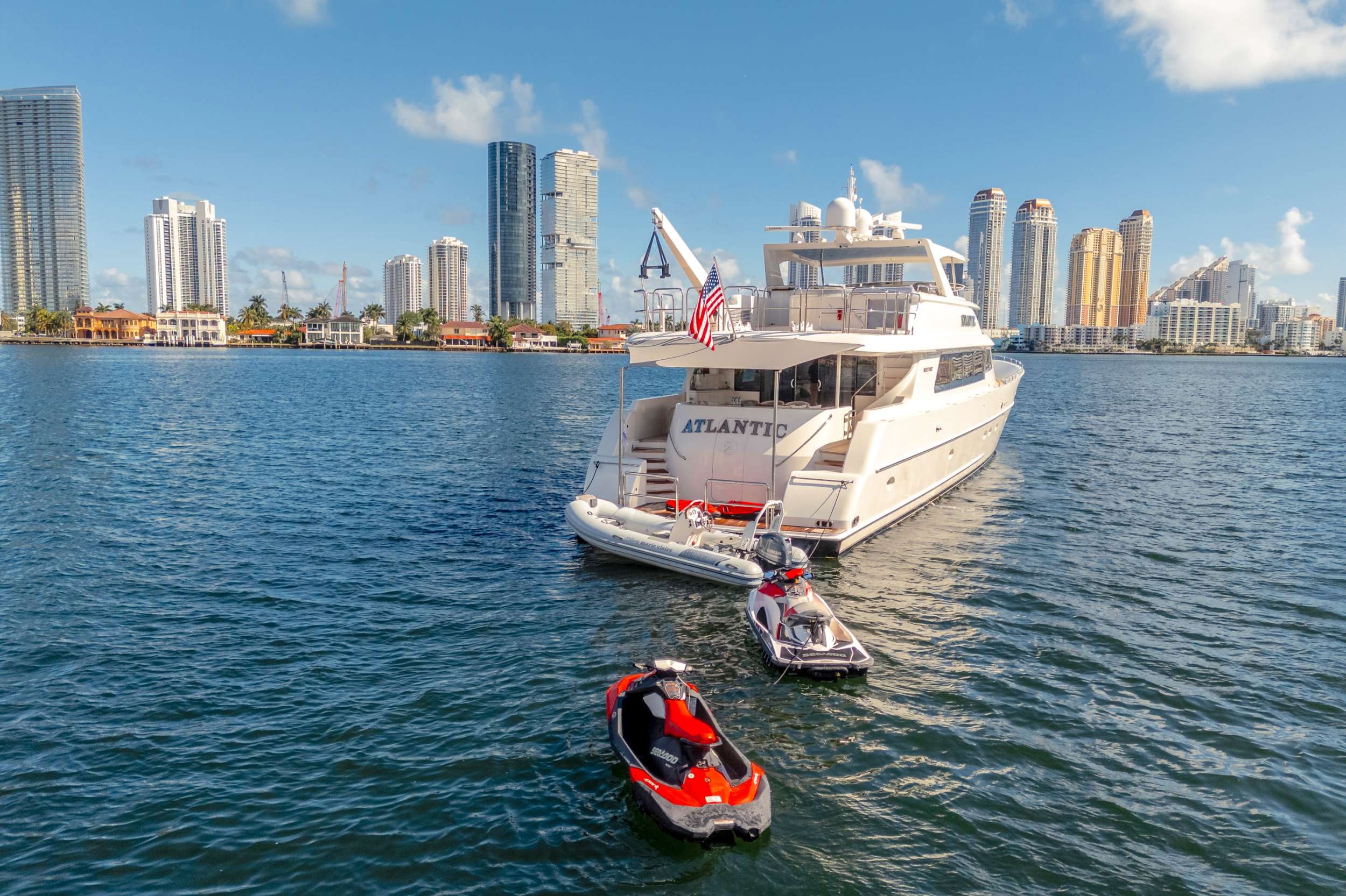 Rib tender, (2) Jet skis and (2) Seabobs