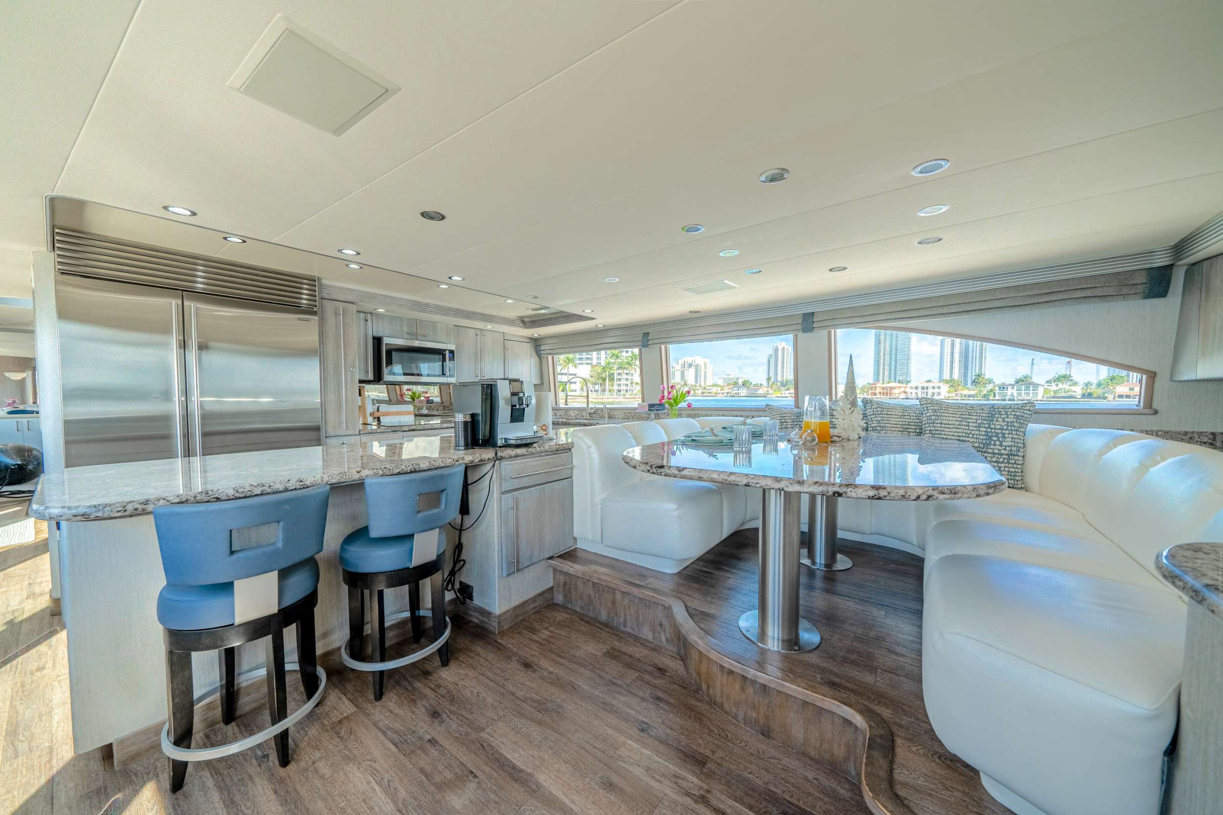 Galley with bar seats and in-formal dining area